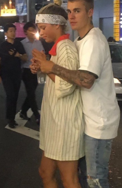 Justin Bieber & Sofia Richie Hold Hands & Cuddle In Japan