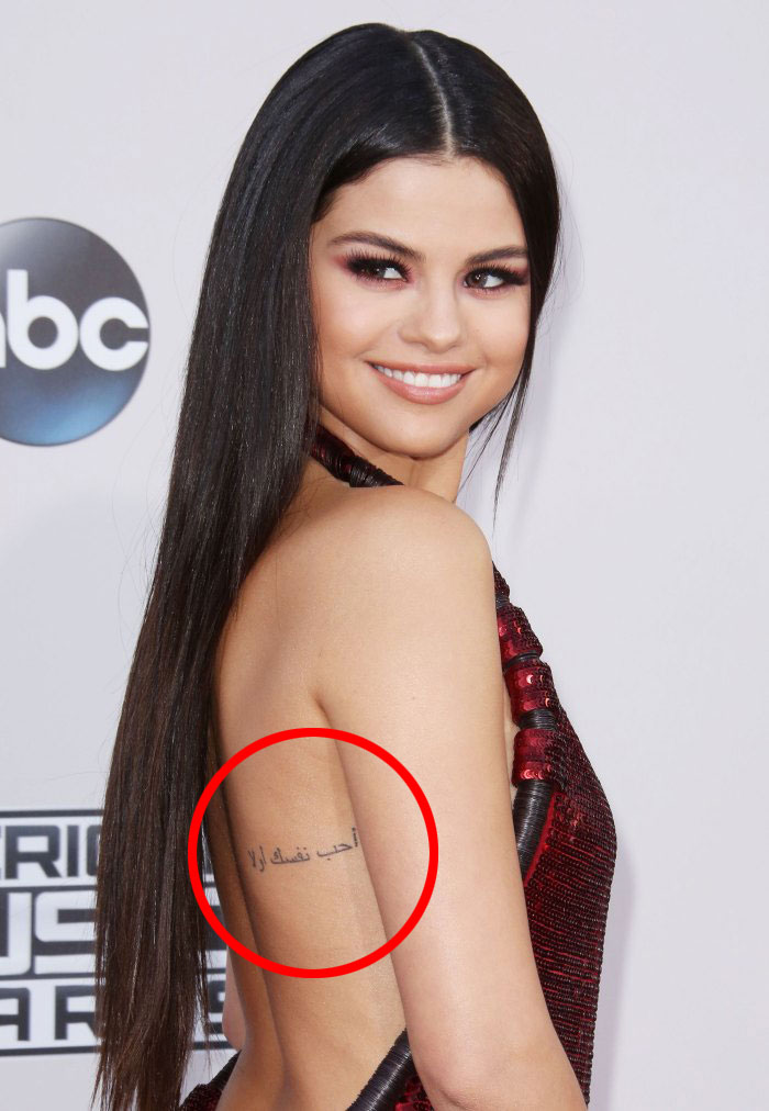 Selena Gomez shows off massive, colorful new back tattoo as she matches ink  with new BFF Cara Delevingne | The US Sun
