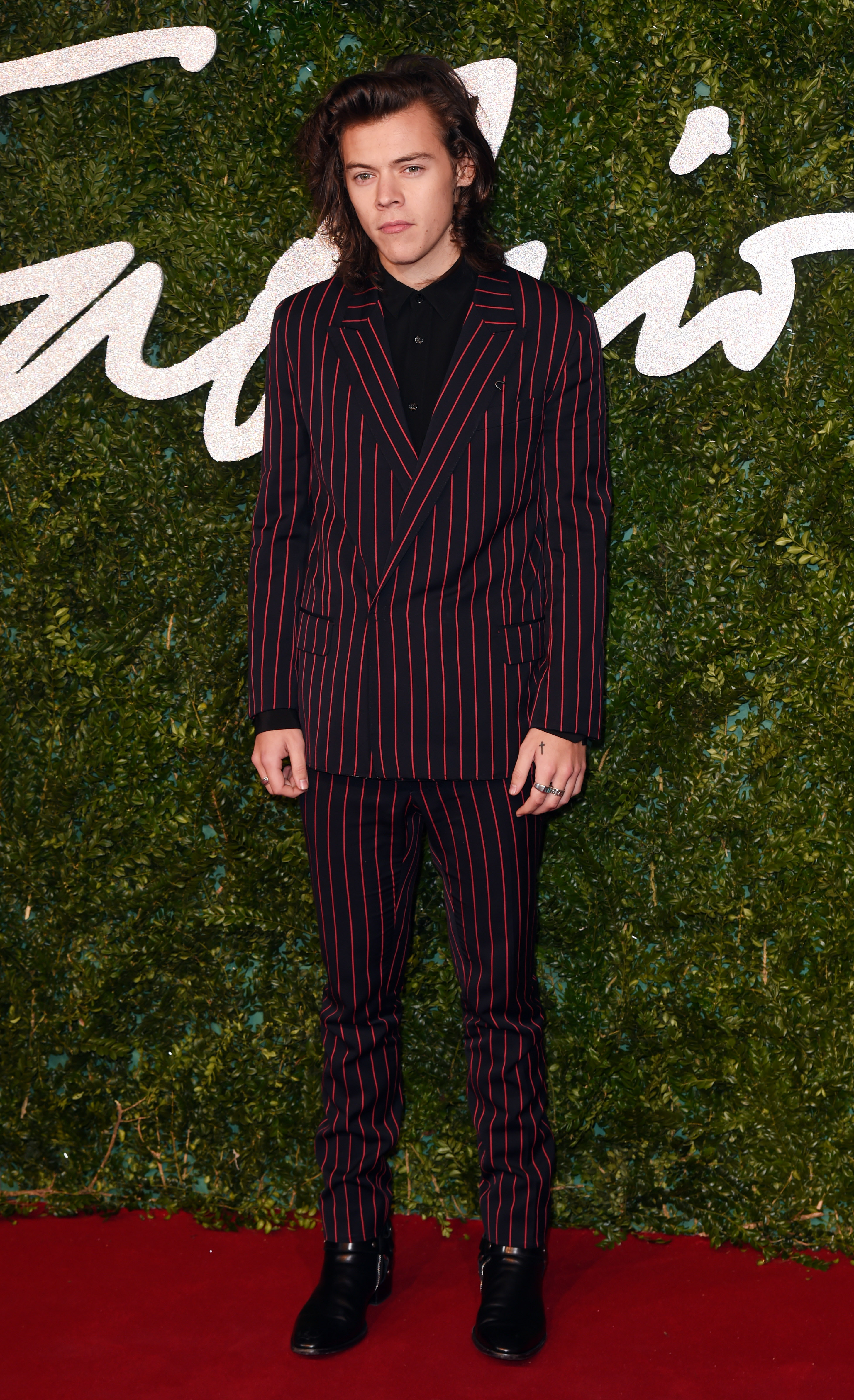 Harry Styles' most stylish moments: from pink feathers at Coachella to  black leather Gucci suits
