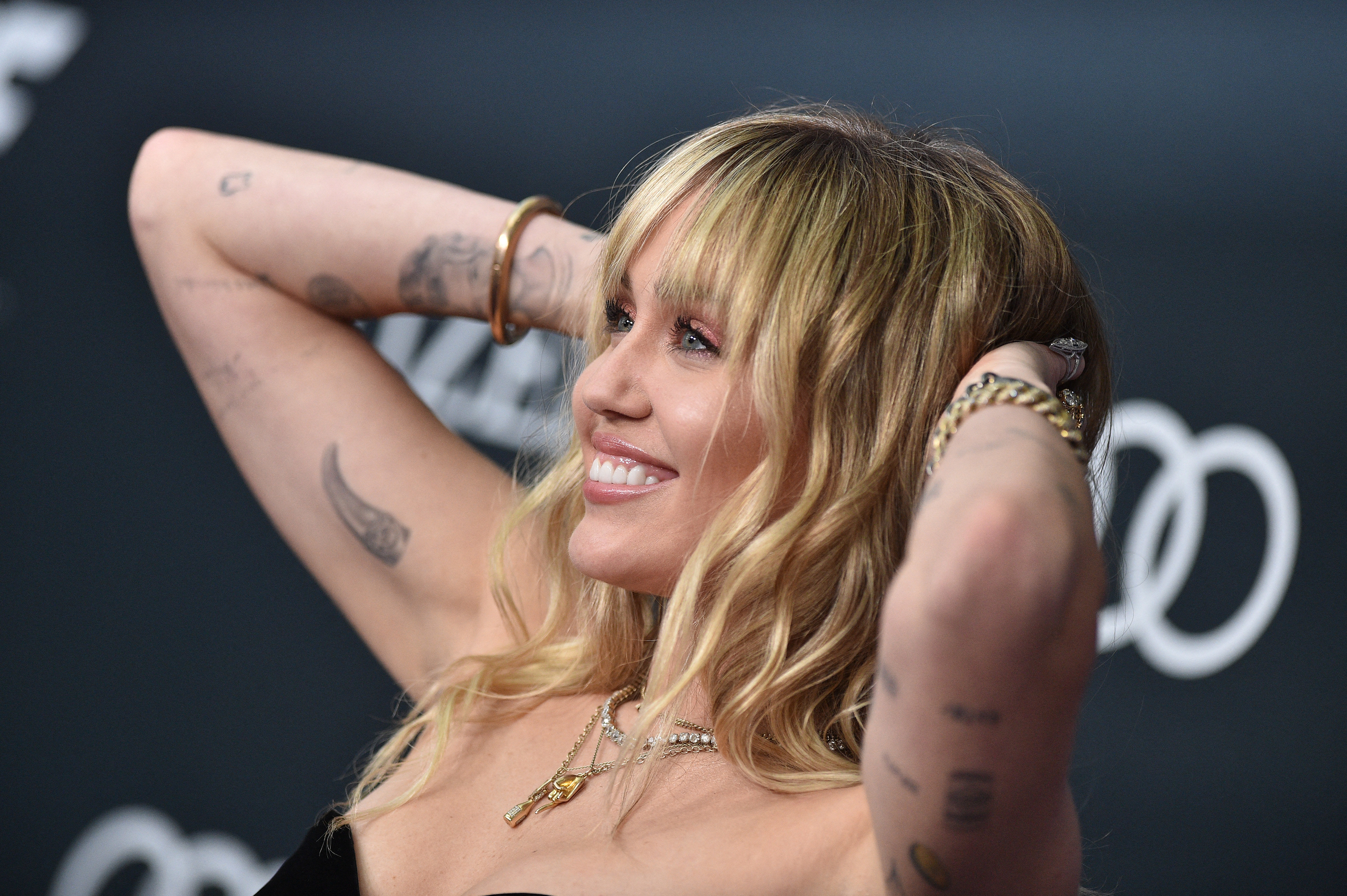Miley Cyrus superfan Carl McCoids tattoos are creepy says popstar  Metro  News