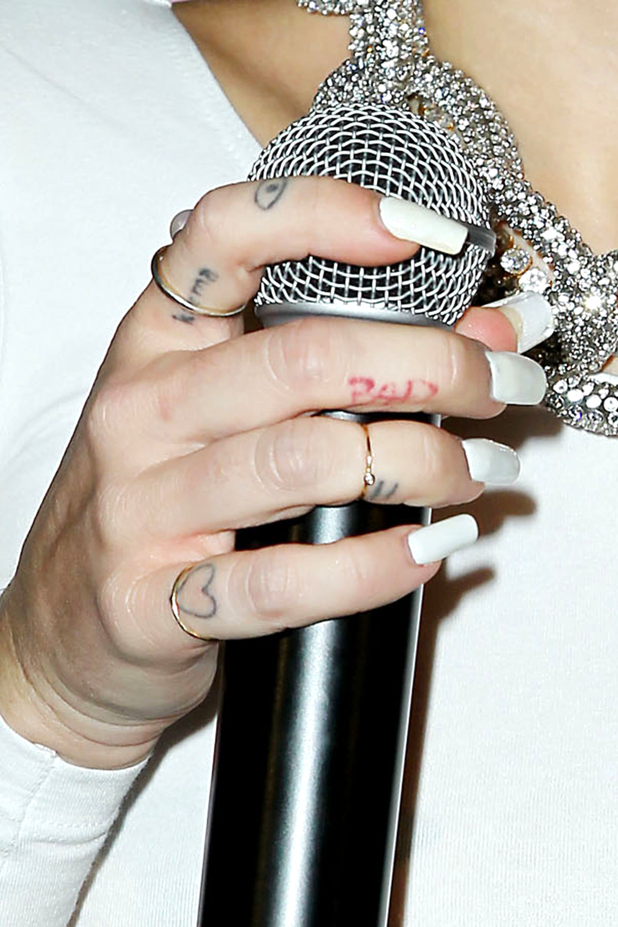 How Many Tattoos Does Miley Cyrus Have? Photos of Her 70 Ink Designs and Meanings