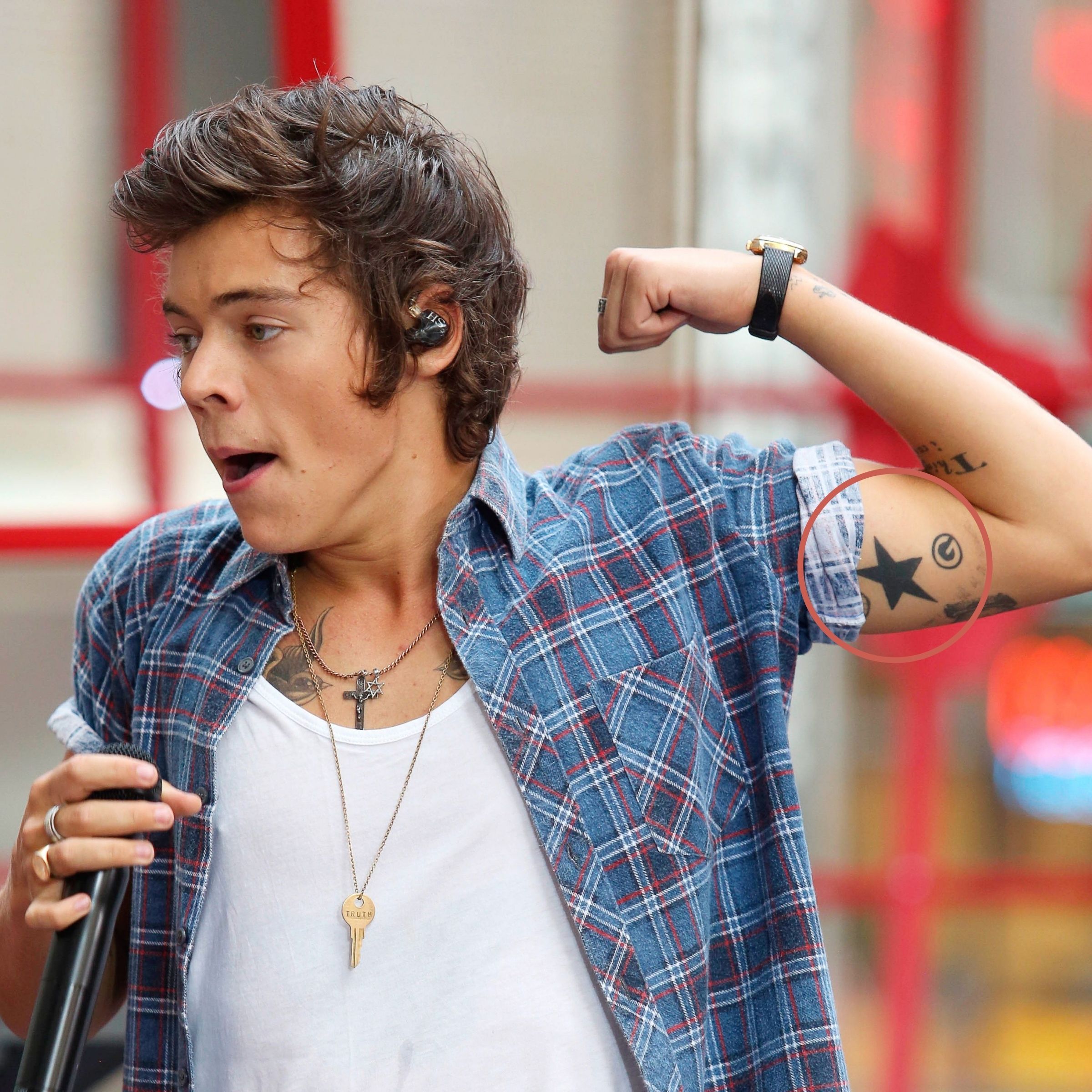 WATCH Harry Styles loses a game and has to get a real tattoo on TV   SHEmazing