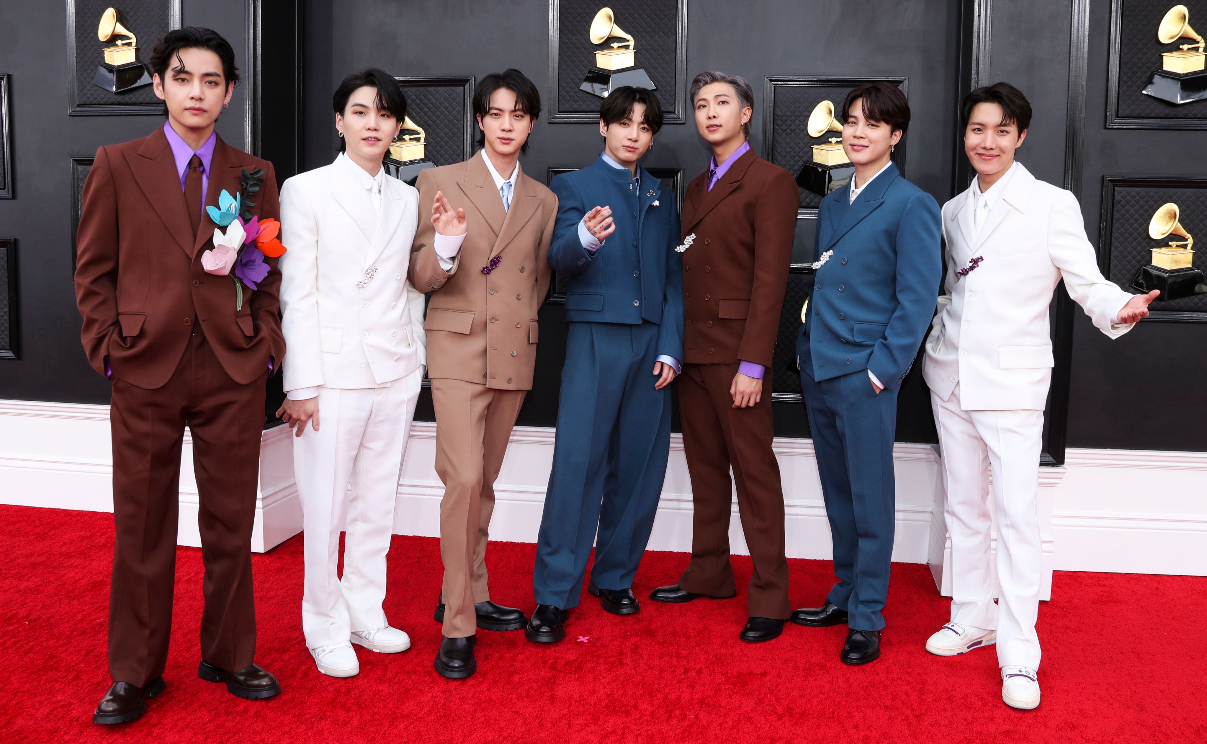 Every time BTS proved they're the best-dressed boy band in the